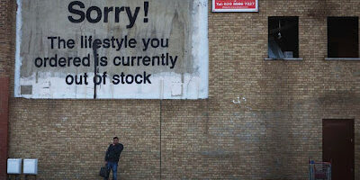 Graffiti by Banksy; photo by Bruce Krasting https://www.flickr.com/photos/bruce_krasting/7695349260
